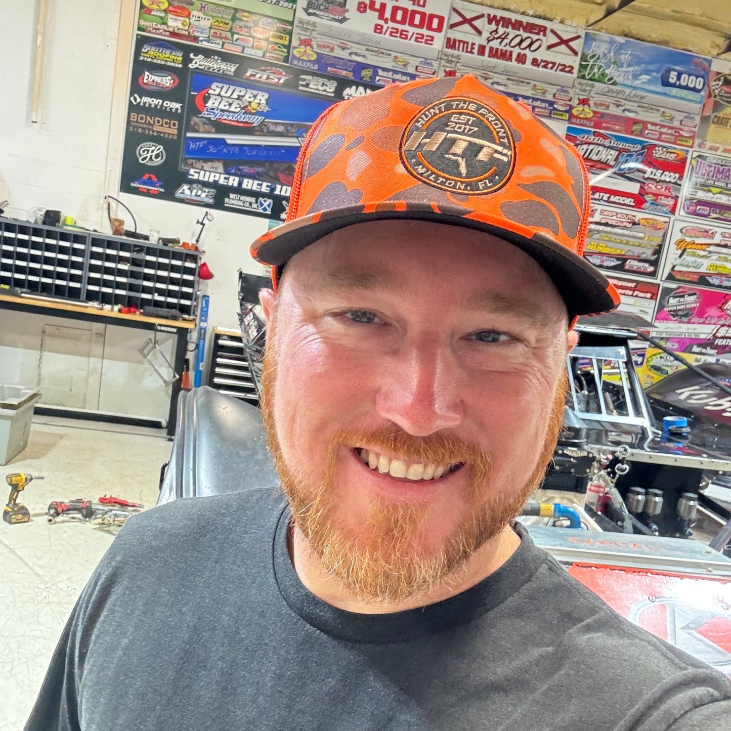 Orange Duck Camo HTF Circle Logo Trucker Hat