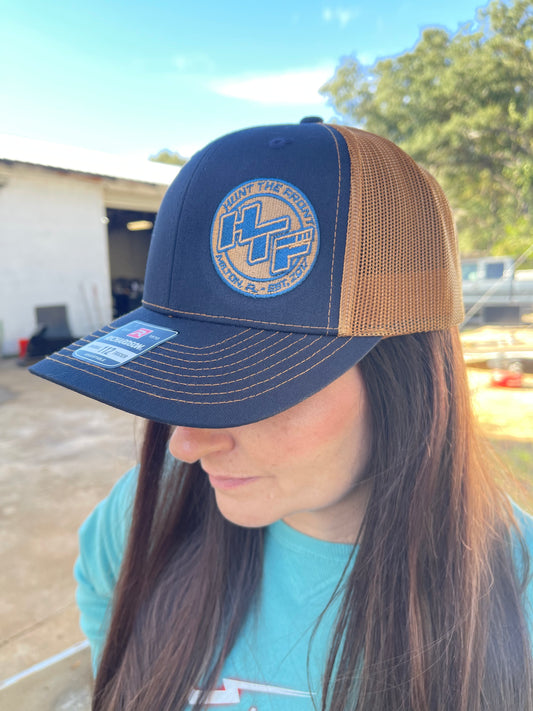 Slanted HTF Circle Logo Trucker Hat - Navy / Caramel